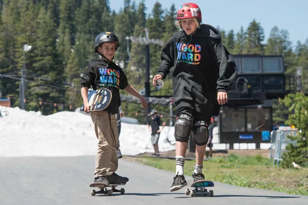 kids skateboarding and recylcing