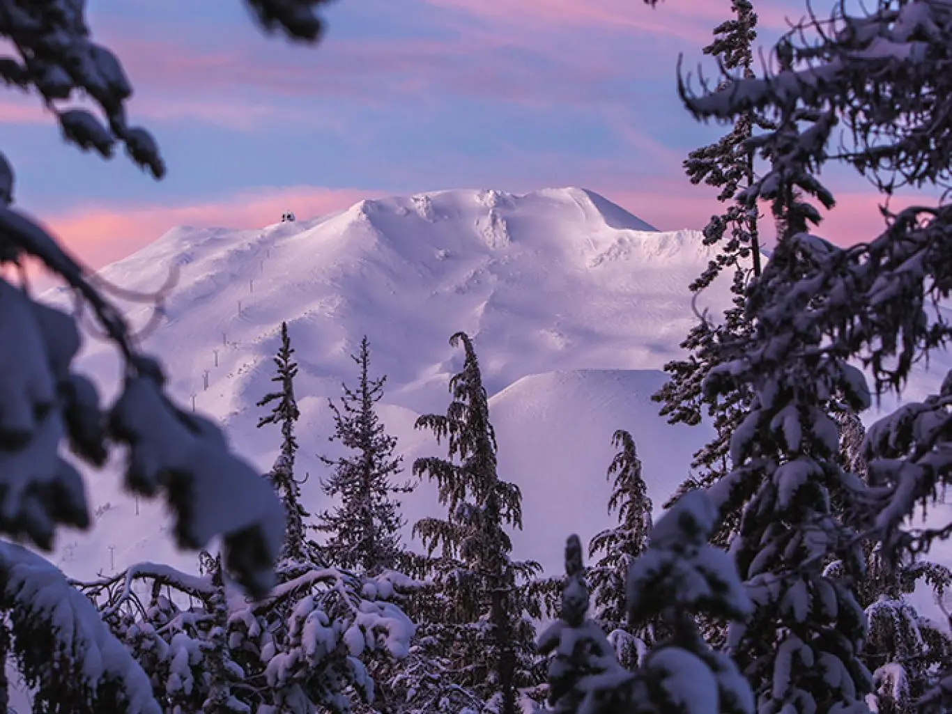 Photo of snow covered mountain